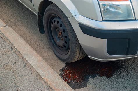 car leaking red|Car Leaking: How to Identify The Dripping Liquid And。